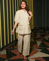 Crafted from premium Vatican fabric, this ensemble features delicate handwork