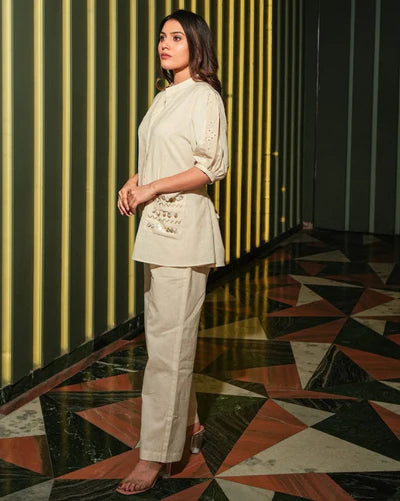Crafted from premium Vatican fabric, this ensemble features delicate handwork